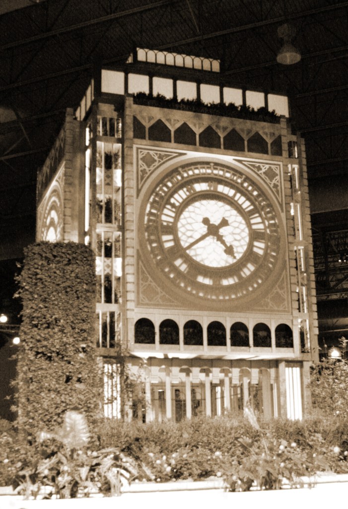 Sepia overtone photo of clock.